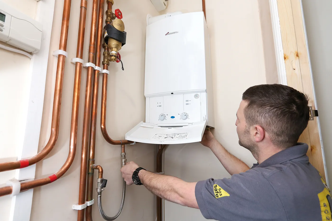 Gas Safe registered engineer carrying out a boiler service